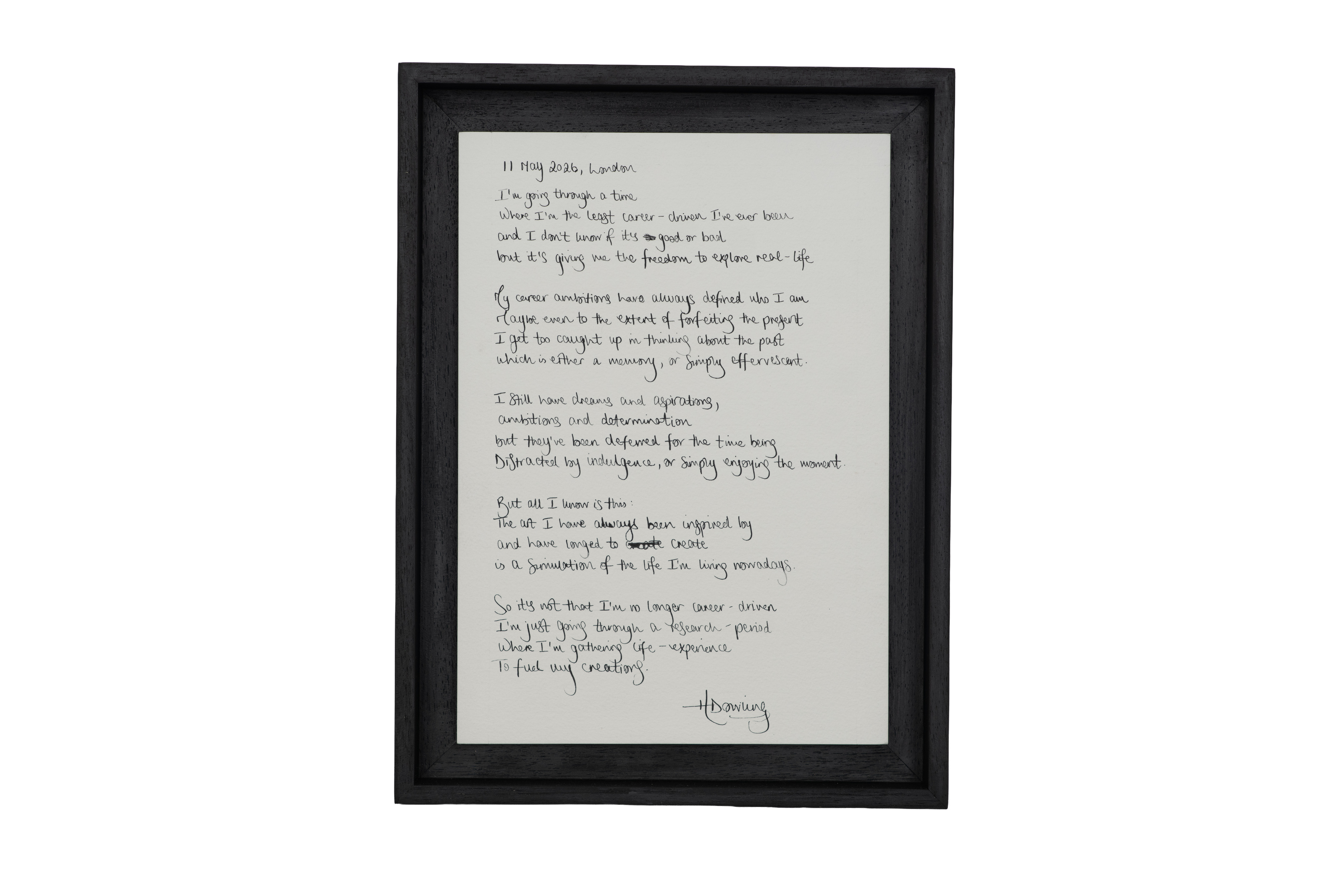 Hannah Dowling, 11 May 2026, London. A tall black frame containing a long handwritten poem on pale paper.